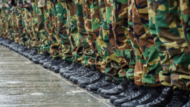 Military,Boots,And,Camouflage,Trousers,Of,Many,Soldiers,In,Uniform