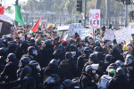LOS ANGELES, CALIFORNIA - JUNE 08: Protesters confront police following recent raids by Immigration and Customs Enforcem