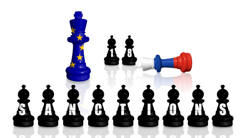 Europe Union sanctions and embargo for Russian war and aggression in Ukraine. Chess made from flags of EU and Russia. 18 sanctions package