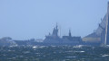 Putin sends warship to shield shadow fleet