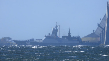 Putin sends warship to shield shadow fleet