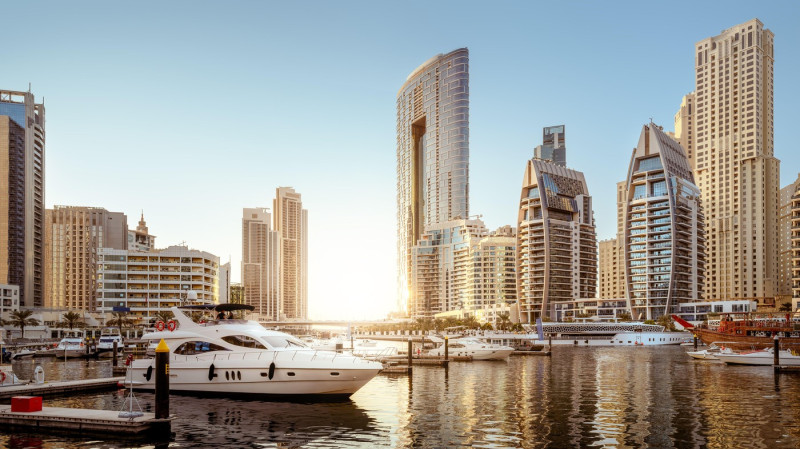 Modern buildings of the dubai marina during sunset