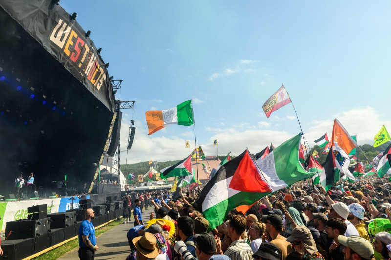 Somerset, UK. 28 June 2025. Kneecap performing during the Glastonbury Festival at Worthy Farm in Somerset. Photo credit should read: Matt Crossick/Empics/Alamy Live News