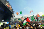 Somerset, UK. 28 June 2025. Kneecap performing during the Glastonbury Festival at Worthy Farm in Somerset. Photo credit should read: Matt Crossick/Empics/Alamy Live News