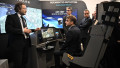 Le président Emmanuel Macron visite le stand Thales lors de la 55ème édition du Salon International de l'Aéronautique et de l'Espace de Paris-Le Bourget