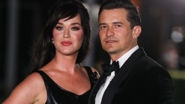 (FILE) Katy Perry and Orlando Bloom split after nearly 10 years together. LOS ANGELES, CALIFORNIA, USA - SEPTEMBER 25: American singer, songwriter, and TV personality Katy Perry wearing a Louis Vuitton dress and fiance/actor Orlando Bloom arrive at the Ac