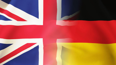 Germany,UK waving flags background.British and German flags together