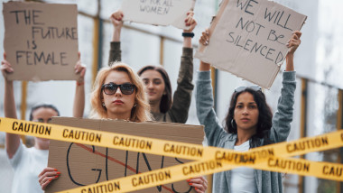 Displeased people. Group of feminist women have protest for their rights outdoors