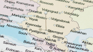 macro photo of a white pin needle into Stavropol city of Russia political map