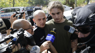 vlad pascu escortat de politisti
