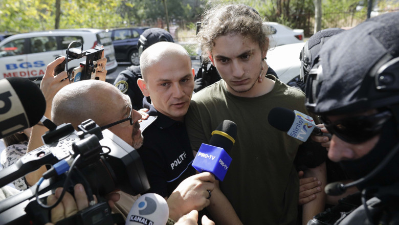 vlad pascu escortat de politisti