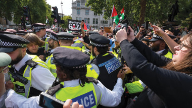 Westminster, London, UK. 56h September 2025. Defend our Juries Parliament Square Mass Protest. As police arresting protesters after Big Ben chimes at 1pm protesters are expected to become more un-cooperative than at previous protests. Defend our Juries we