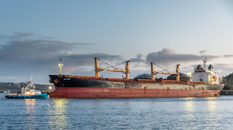 Marino Point, Cork, Ireland. 07th November, 2023. Siezed drug ship MV Matthew is assisted by the tug boat Gerry O'Sullivan as she performs a turning manoeuvre on the River Lee at dawn before transferring from Marino Point to a new berth at Ringaskiddy, Co