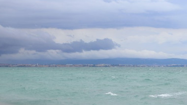 Stormy weather at sea, waves close-up. Bulgaria, Black Sea near the city of Pomorie. Waves on the sea near the shore in the evening. Sea evening