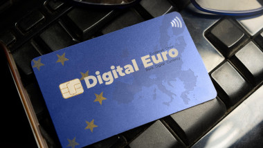 Digital euro currency concept: a credit card on a computer keyboard