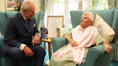 King Charles III meets world's oldest person
