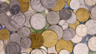 Ukrainian kopiika coins close up. Big amount of ukrainian money on table. Business and stock concept for Ukrainian currency. Ukrainian kopiika coins