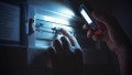Investigate a home fuse box during a power outage. Blackout concept