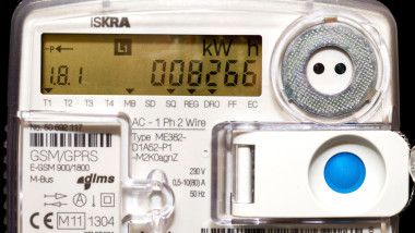 a smart digital kilowatt or electricity meter is telling the usage of electricity in a home direct to the provider.