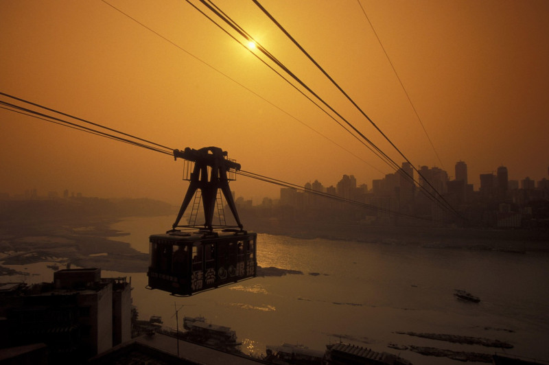 the cable car on the way over the yangzee River in the city of Chongqing in the province of Sichuan in china in east asia. . ASIA CHINA CHONGQING
