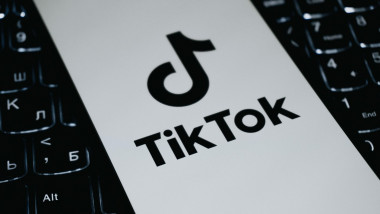 TikTok logo on the screen.