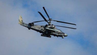 A Russian Ka-52 "Alligator" attack helicopter flies over Panteleimonivka