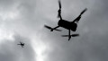 Drone is flying in the sky. Operator controls the drone. War in Ukraine