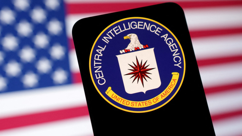 Illustration shows CIA (Central Intelligence Agency) logo and U.S. flag