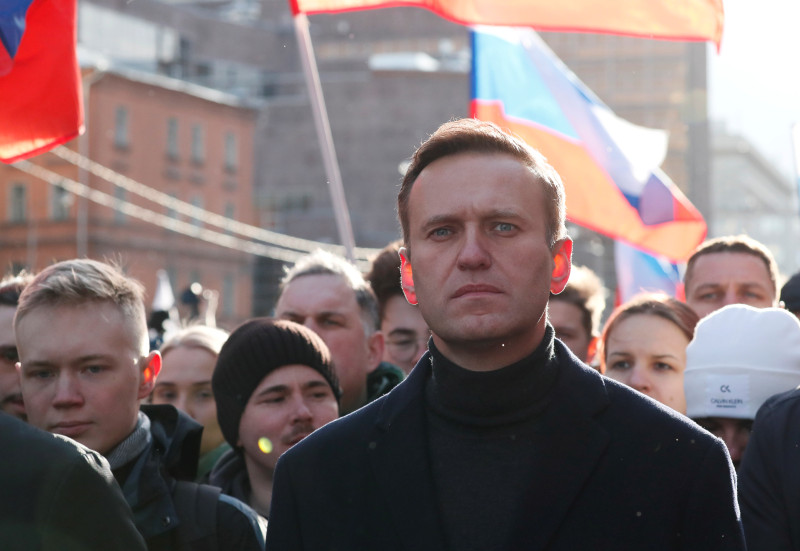Russian opposition politician Alexei Navalny takes part in a rally to mark the 5th anniversary of opposition politician Boris Nemtsov's murder and to protest against proposed amendments to the country's constitution, in Moscow