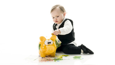 Business Baby with piggybank