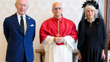 Pope Leo XIV meets with Britain's King Charles and Queen Camilla during a private audience at the Vatican