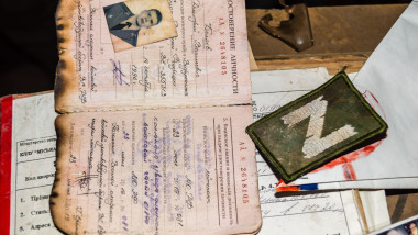Kharkiv, Ukraine, July 22, 2025 Military memorabilia consisting of various Russian army items, such as documents and shells recovered from the battlef