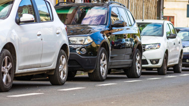 Parked cars along a street in Bucharest, Romania, 2020.