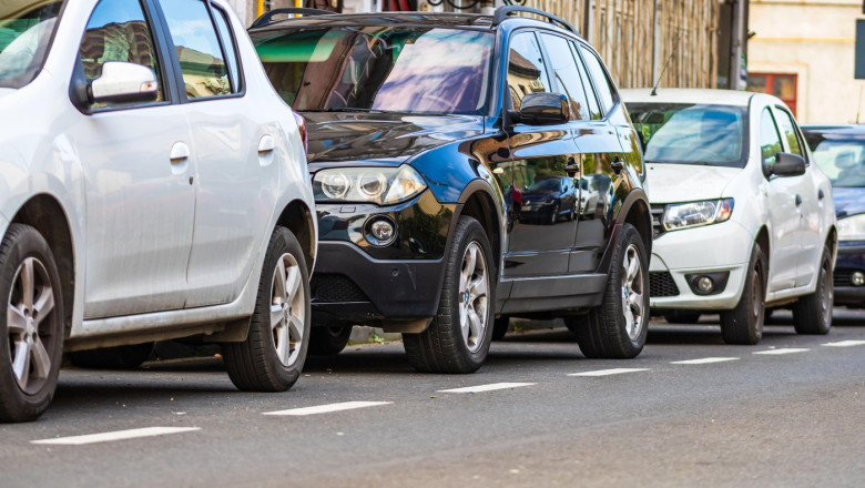 Parked cars along a street in Bucharest, Romania, 2020.