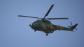 IAR-330 Puma military helicopter of the Romanian Air Forces in flight.