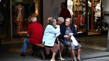Old People sitting on a Bench in Chiavari in Liguria, Italy