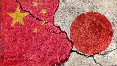 Grunge country flag illustration (cracked concrete background) / Japan vs China (Political or economic conflict)