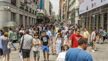 People visiting the street prized in Madrid. This is the busiest pedestrian street of Madrid.