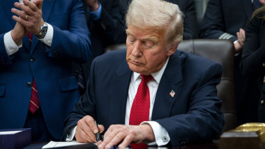 President Donald J Trump Signs Bill To Reopen Government In Oval Office In Washington District Of Columbia United States - 12 Nov 2025