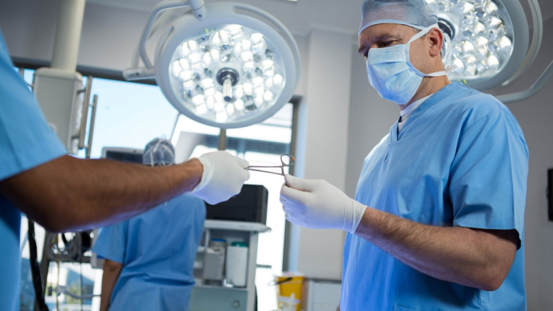 Surgeons preparing for surgery