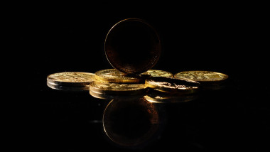 Dark altcoin on market. Independent stablecoin. New cryptocurrency on a top of coins against black mirror surface. Black crypto token. Noname or nameless coin. Alternative type of digital asset.