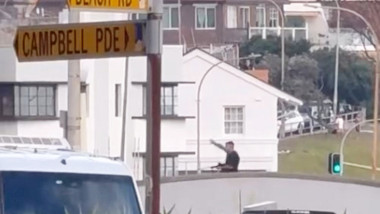 Chilling moment Bondi Beach gunman opened fire from bridge