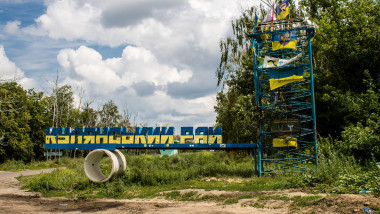 Kupiansk, Ukraine, June 25 2024 Entrance to Kupiansk district. Soldiers and volunteers are used to signing and leaving flag at the entrance to the dis