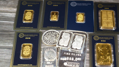 Cairo, Egypt, May 16 2025: BTC Bullion Trading Center pure gold bars and fine silver bars of different weights, gold investment, exchange price rate,