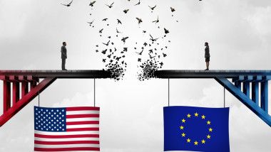 Europe US Separation as a European Union United States Divorce as a couple on a broken fading bridge flying away as a divided national relationship co