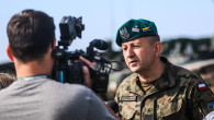 Polish Brig. Gen. Jarosław Gromadziński, 15th Mechanized Brigade commander, is interviewed by local reporters shortly after a combined live fire exercise for exercise Puma 2 with Battle Group Poland at Bemowo Piskie Training Area, Poland on June 15, 2018