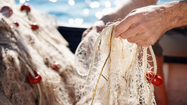 Fisherman holding nets