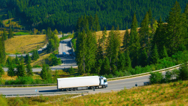 Long vehicle truck on a mountains road in Romania