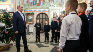 Russia'S President Putin At Christmas Service Outside Moscow