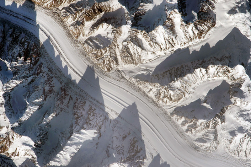 Photograph from the International Space Station of the Pamir Mountains, Tajikistan. Photographed in 2015. Glacier. An optimised and digitally enhanced version of a NASA image / credit NASA